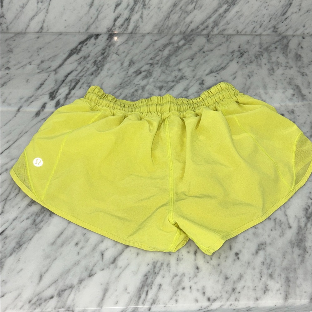 Lululemon hottie hits, 2.5” size 4,  Neon Yellow Shorts daughters outgrew